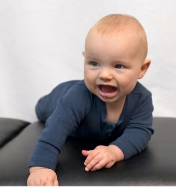 Baby in navy outfit